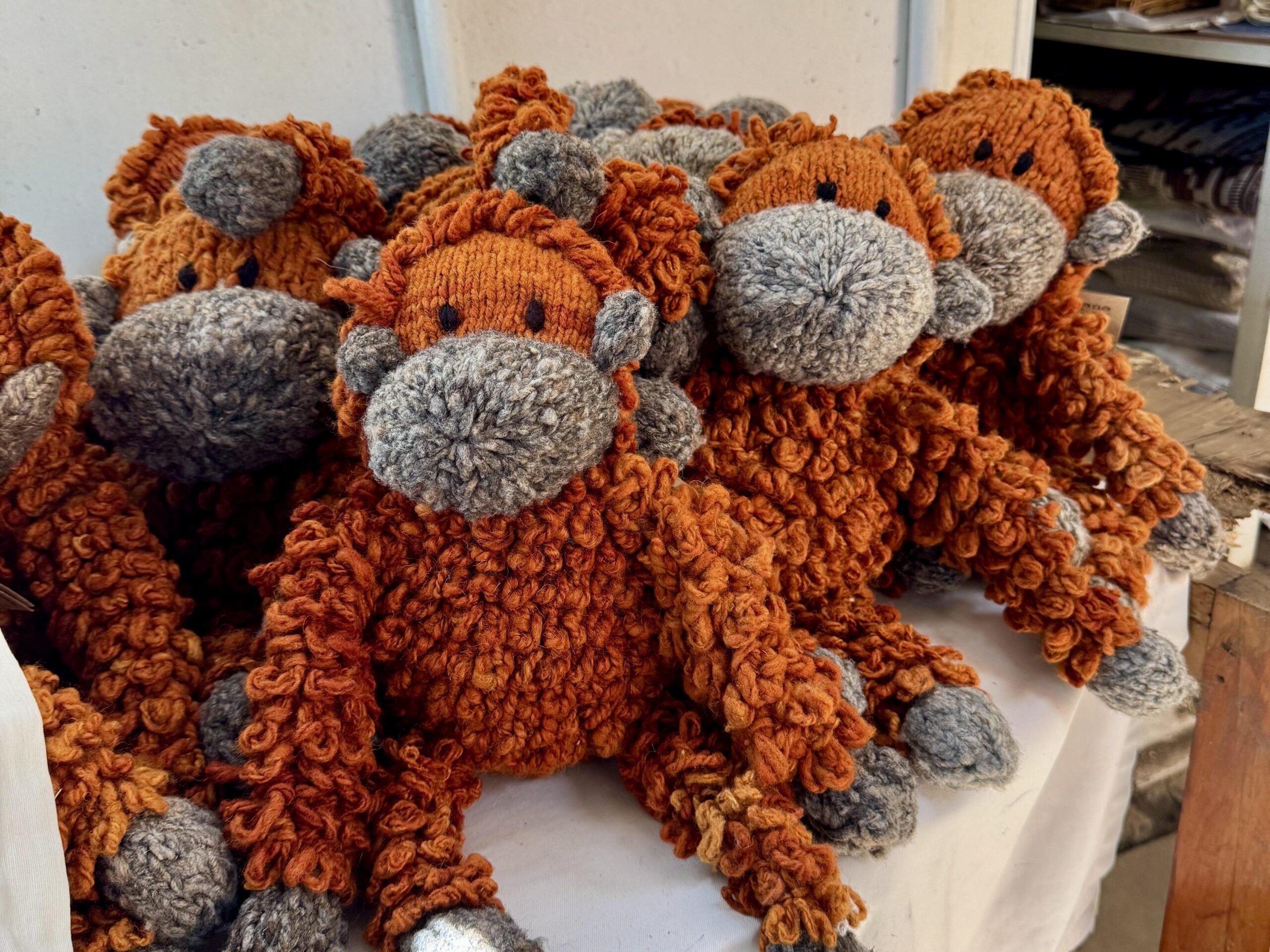 Knitted orangutan toys at Zuri